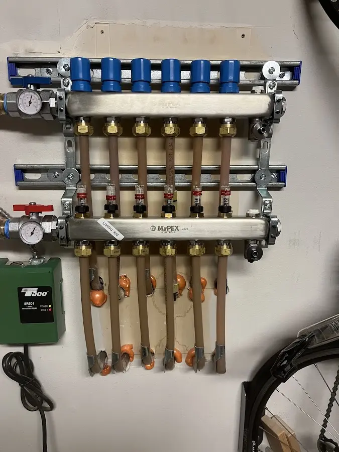 Plumber performing Leak Detection at a residential property in Hicksville